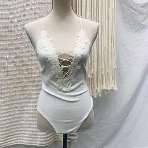 EXPRESS flower appliqué body suit Sz S